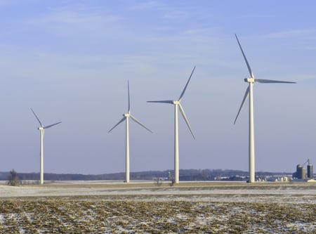 Rural skyscrapers Four wind turbines dominate snowy corn fields, Lee County, Illinois, in January